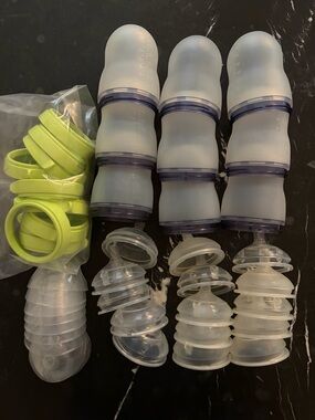 9 Comotomo bottles (8oz) with assorted nipples